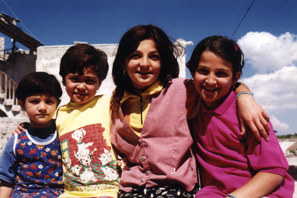 four girls smile for the camera