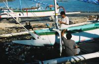 Fisherman working on their boats