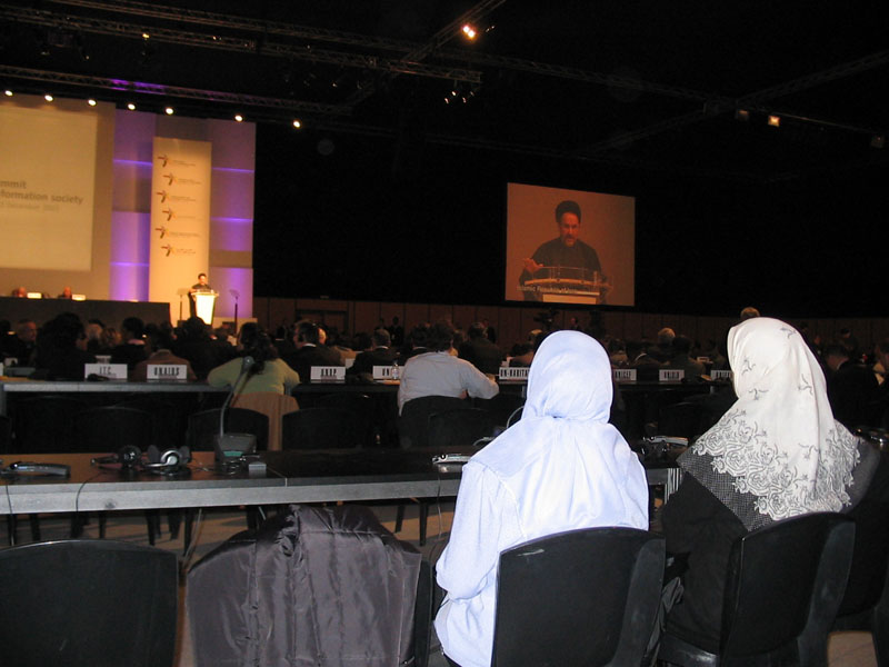 Iranian delegates listen to President Khatami during the plenary